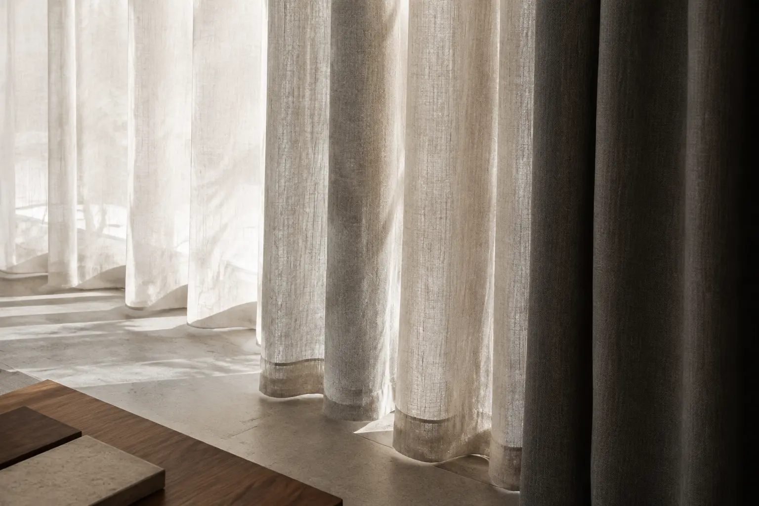 Three textile qualities of differing transparency shown as material samples