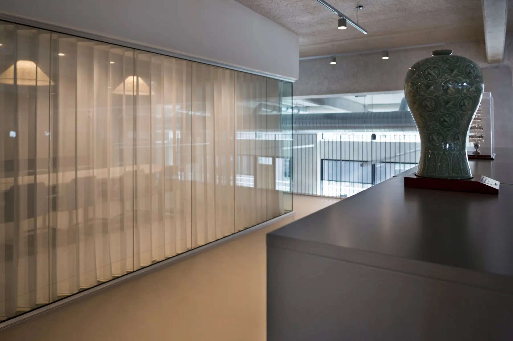 Light curtains along glazed rooms and a circulation area in Nordhavn