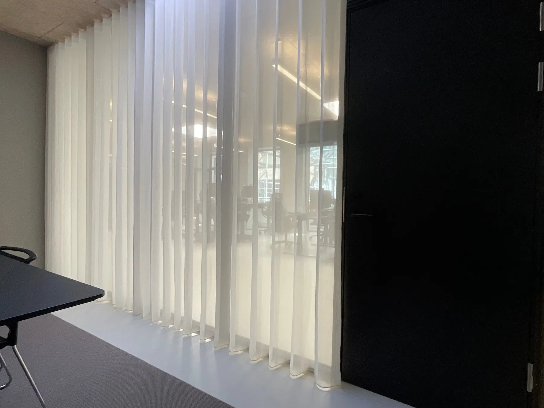 Detail of transparent and dense curtain layers on Store Kongensgade
