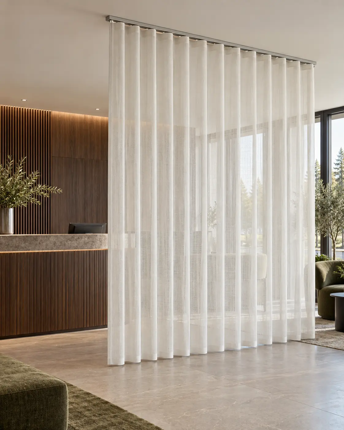 Hotel lounge with layered curtains in wave folds on a visible surface-mounted track