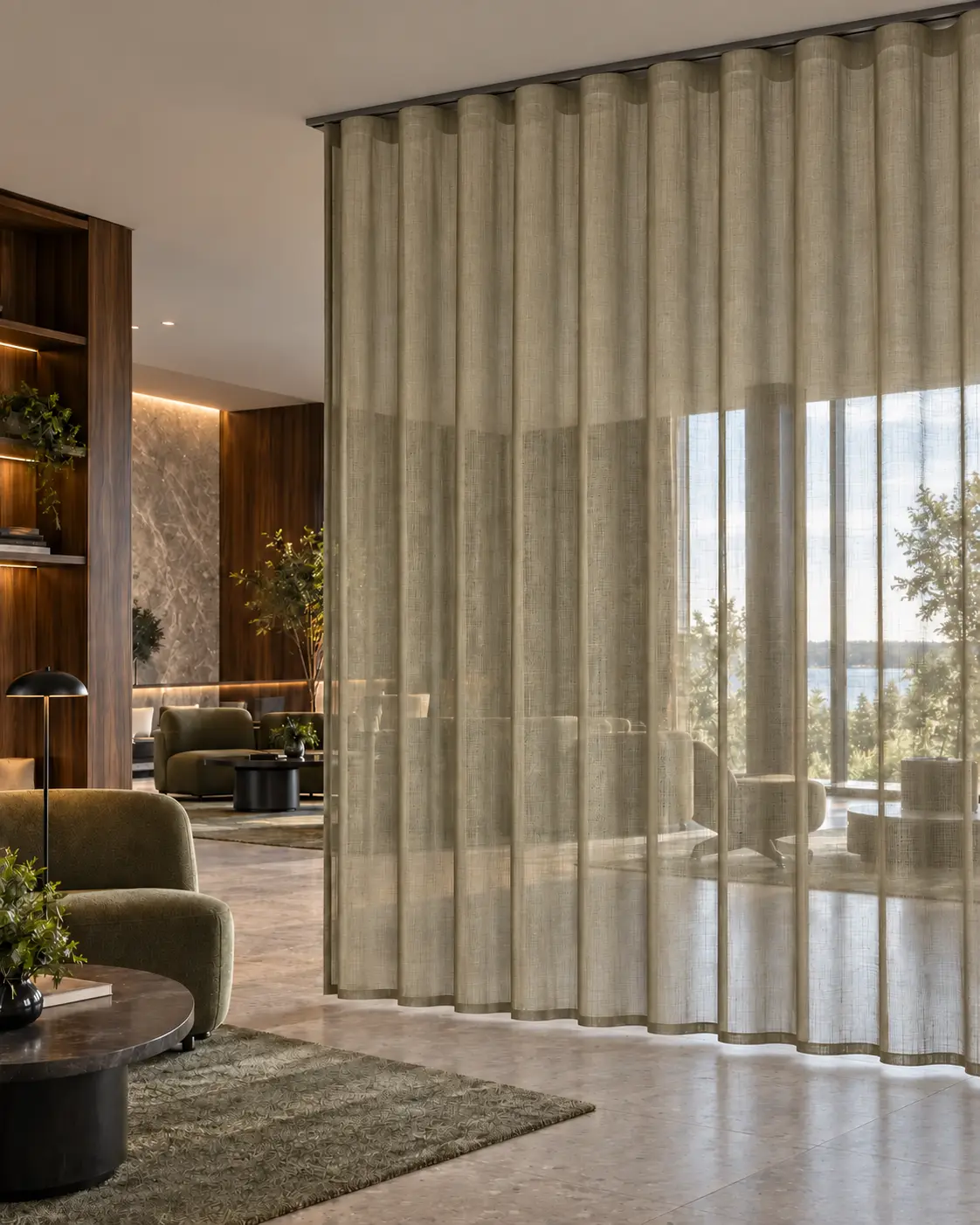 Lounge zone with a semi-transparent curtain in wave folds on a visible track